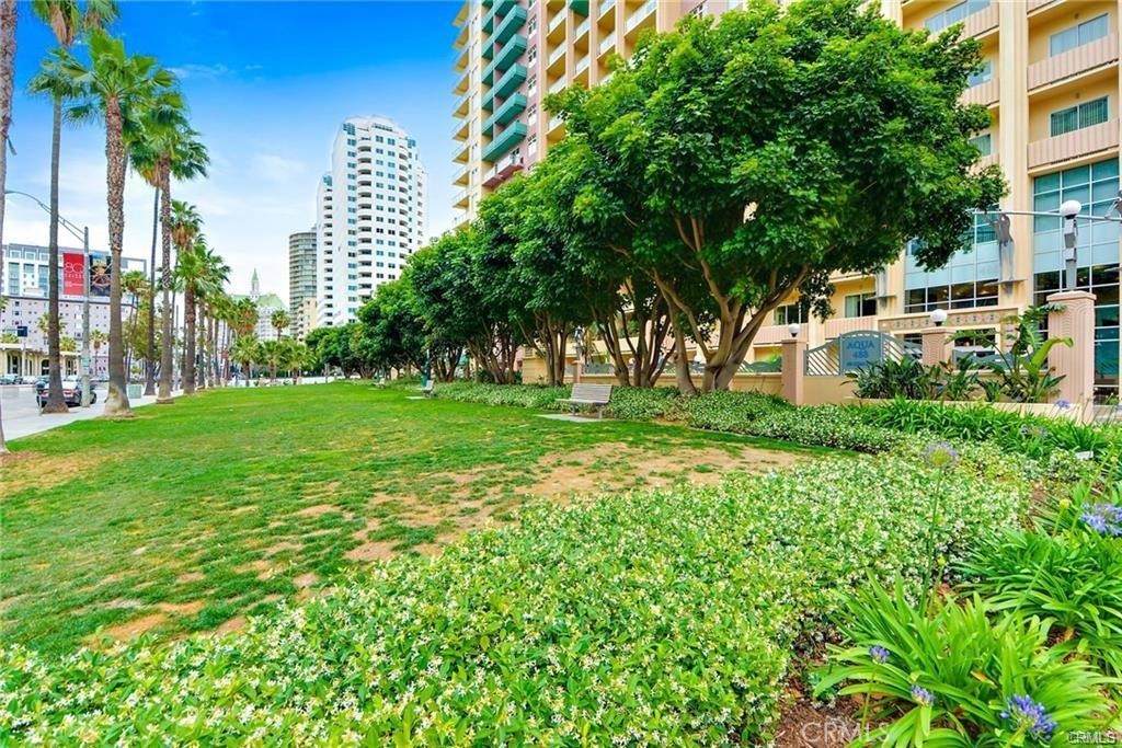 488 East Ocean Boulevard, Unit 618 Long Beach, CA 90802 - Photo 23 of 26 a view of a garden with a building in the background
