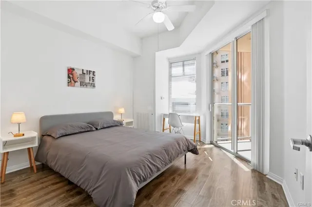 a view of a balcony with chair and front door