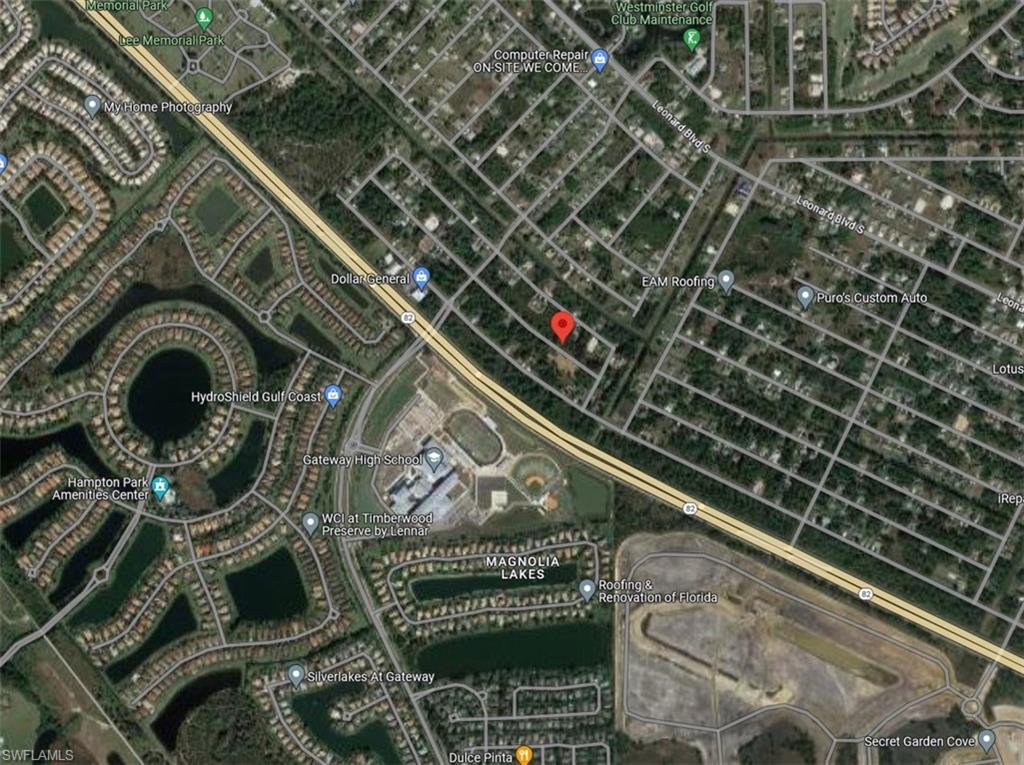 4812-4814 30th Street Southwest Lehigh Acres, FL 33973 - Photo 4 of 5 a close up of a plant in the roof