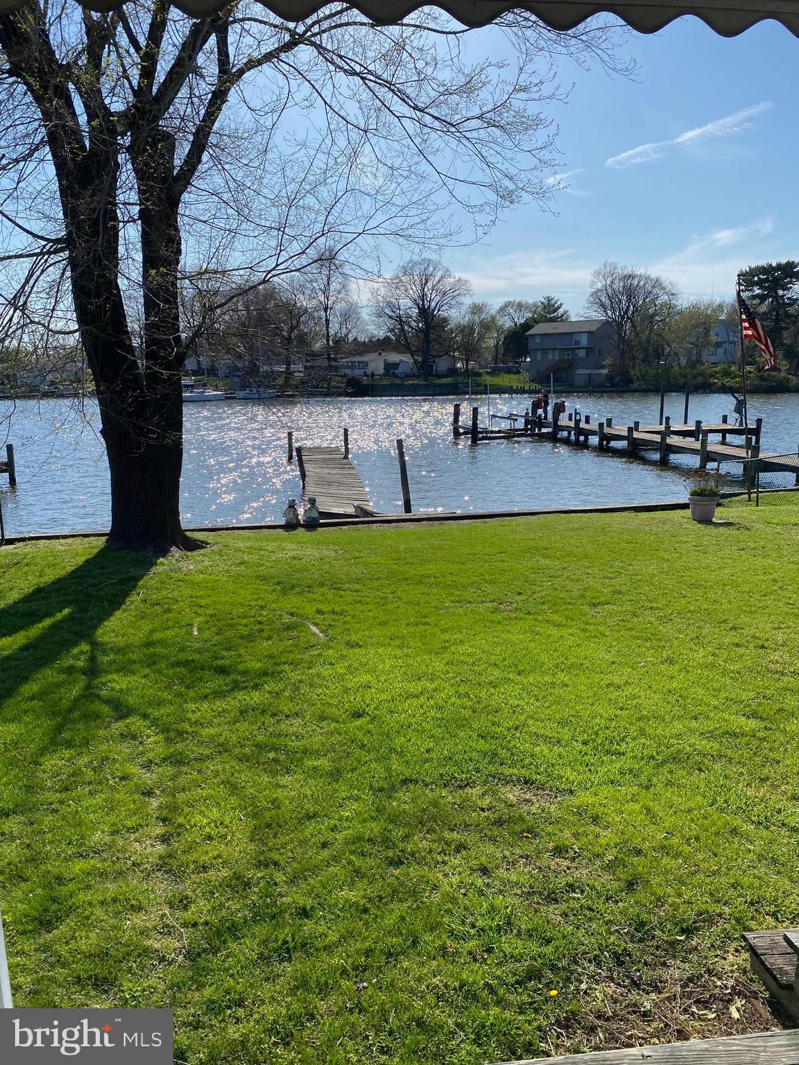 8201 Shore Road Dundalk, MD 21222 - Photo 3 of 24 Back yard looking at water and private pier