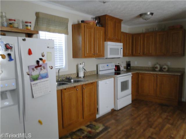 122 Red Kirby Road King, NC 27021 - Photo 8 of 11 Kitchen.