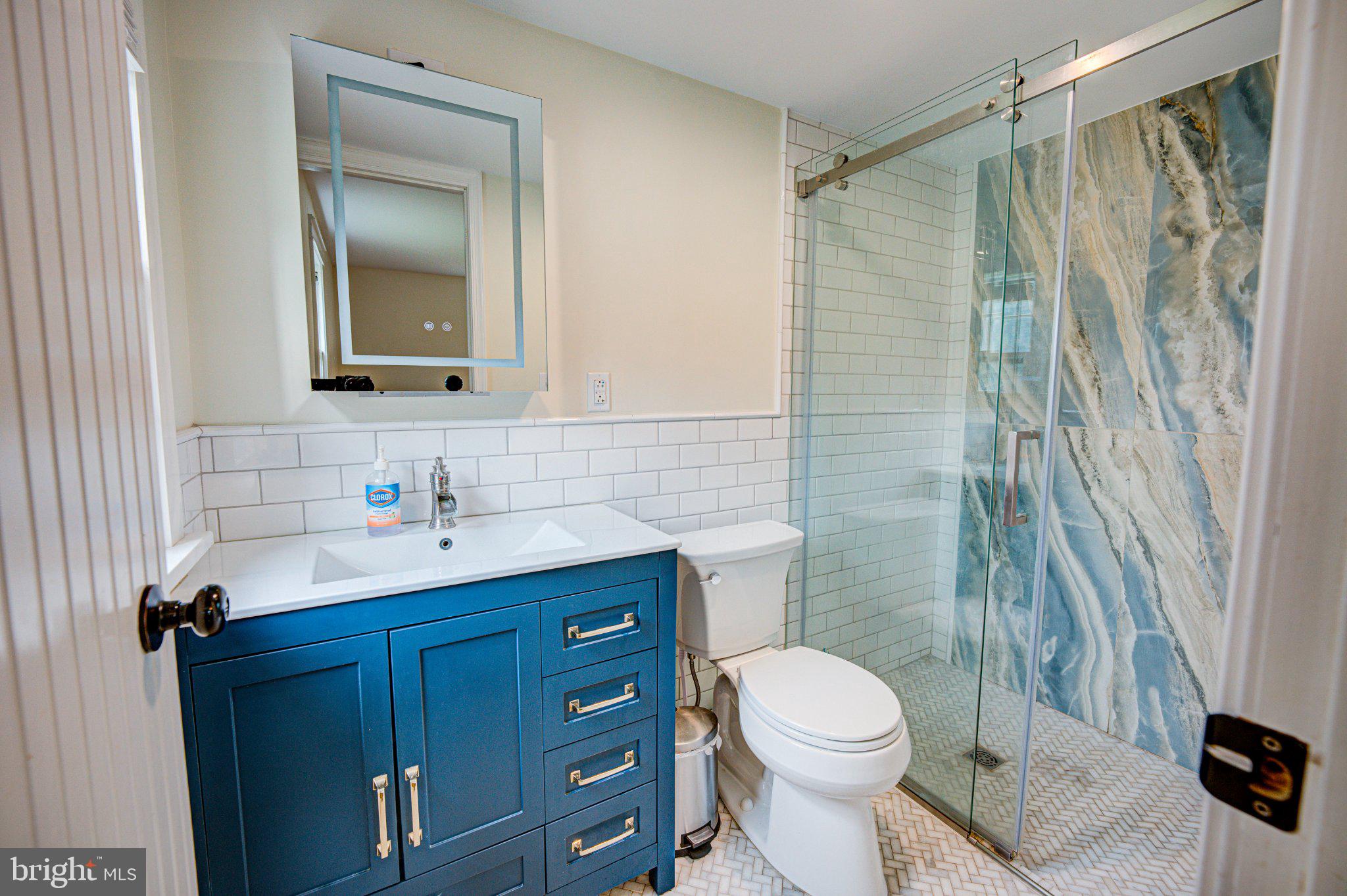 24177 Rapidan Road Mitchells, VA 22729 - Photo 15 of 43 Sleek bathroom with modern finishes.