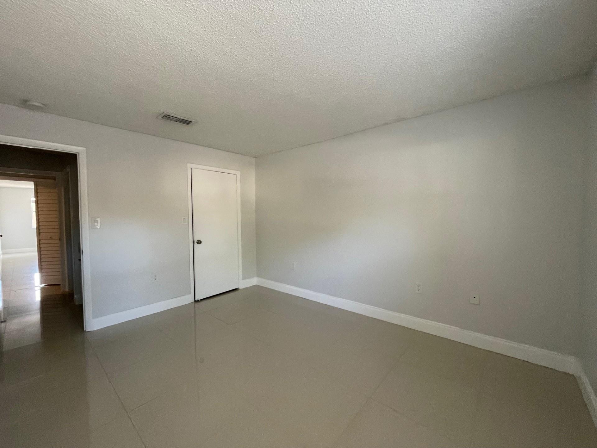 2201 Southwest 80th Terrace, Unit 2201 Miramar, FL 33025 - Photo 23 of 26 a view of an empty room