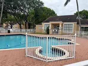 2201 Southwest 80th Terrace, Unit 2201 Miramar, FL 33025 - Photo 25 of 26 a view of house with outdoor seating yard