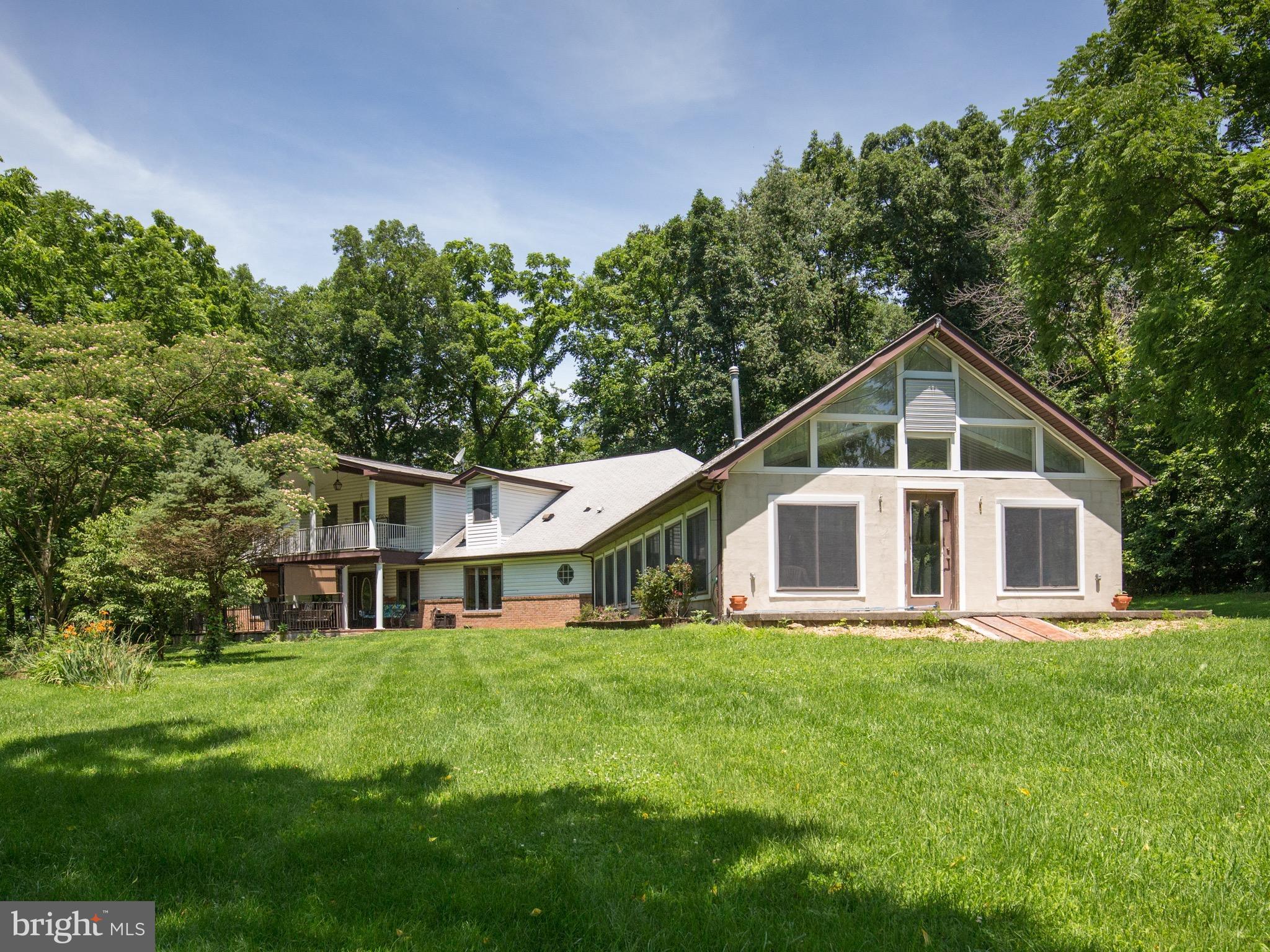 2619 Apple Pie Ridge Road Winchester, VA 22603 - Photo 1 of 29 a front view of house with yard and green space