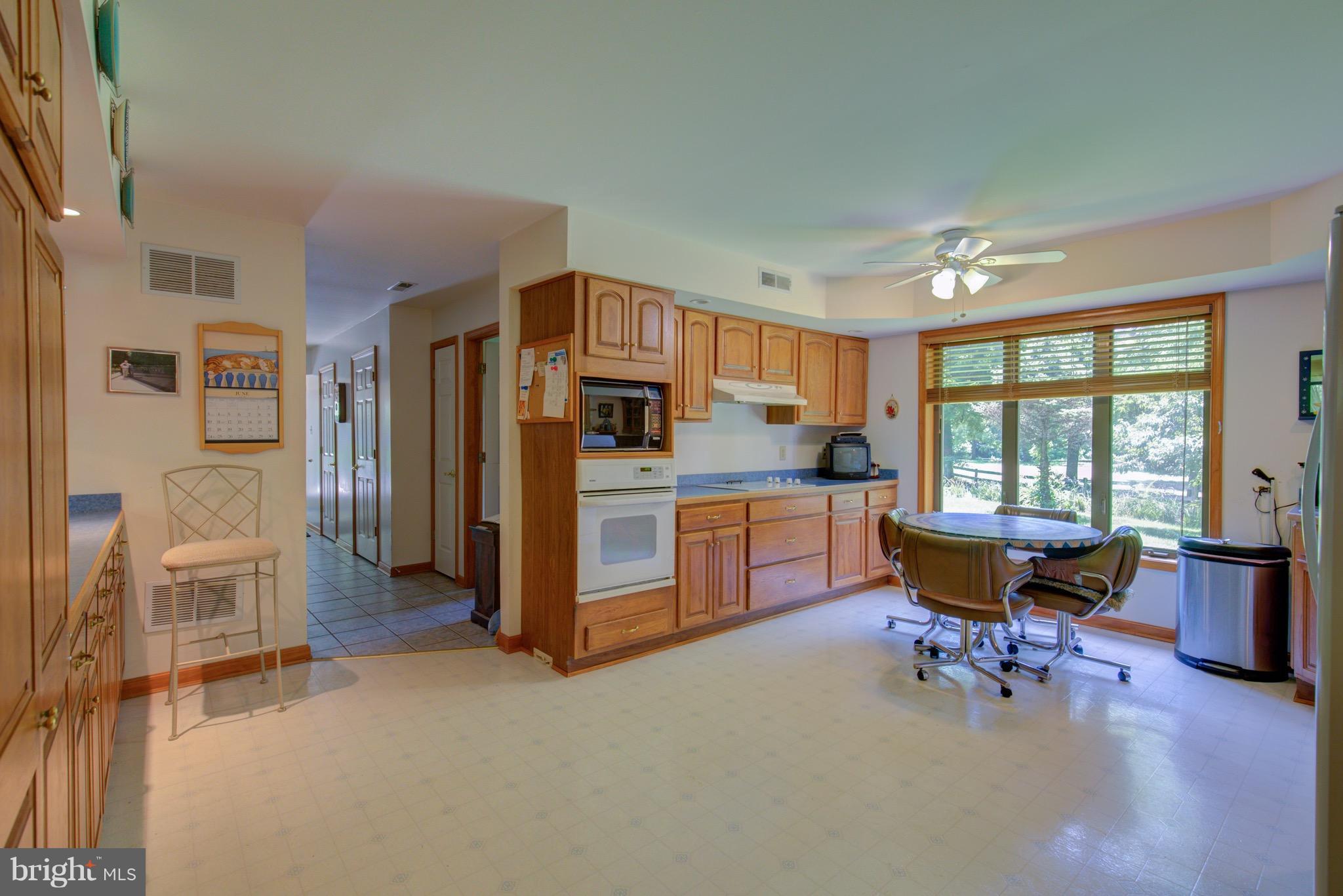 2619 Apple Pie Ridge Road Winchester, VA 22603 - Photo 14 of 29 a living room with furniture and a large window