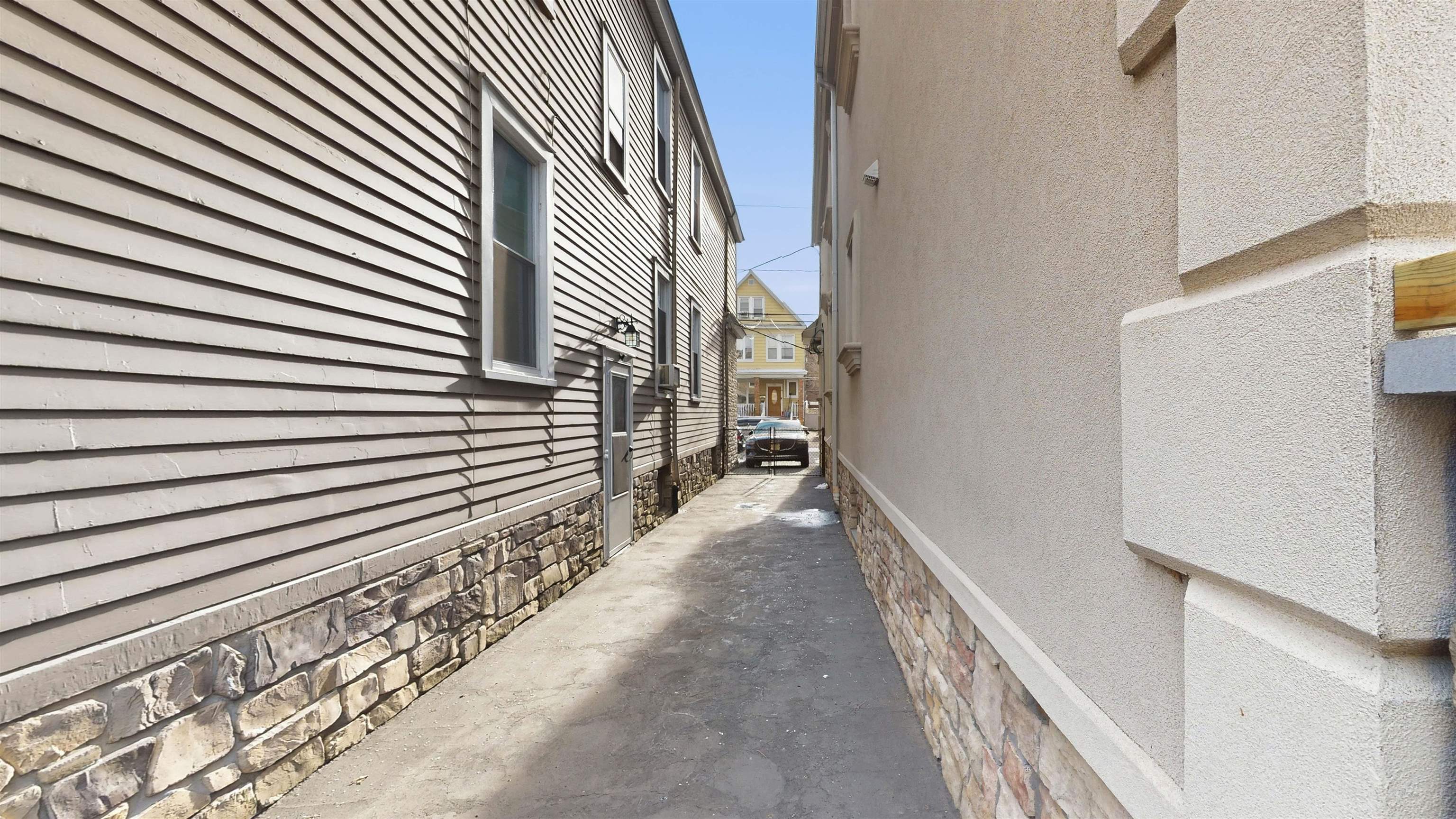 159 West 32nd Street Bayonne, NJ 07002 - Photo 2 of 47 a view of a house with stairs