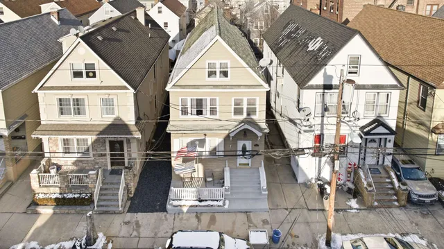a view of multiple houses with a city street