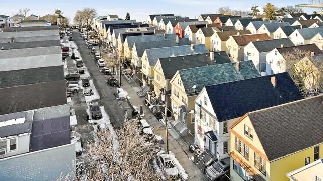 a view of residential houses with outdoor space