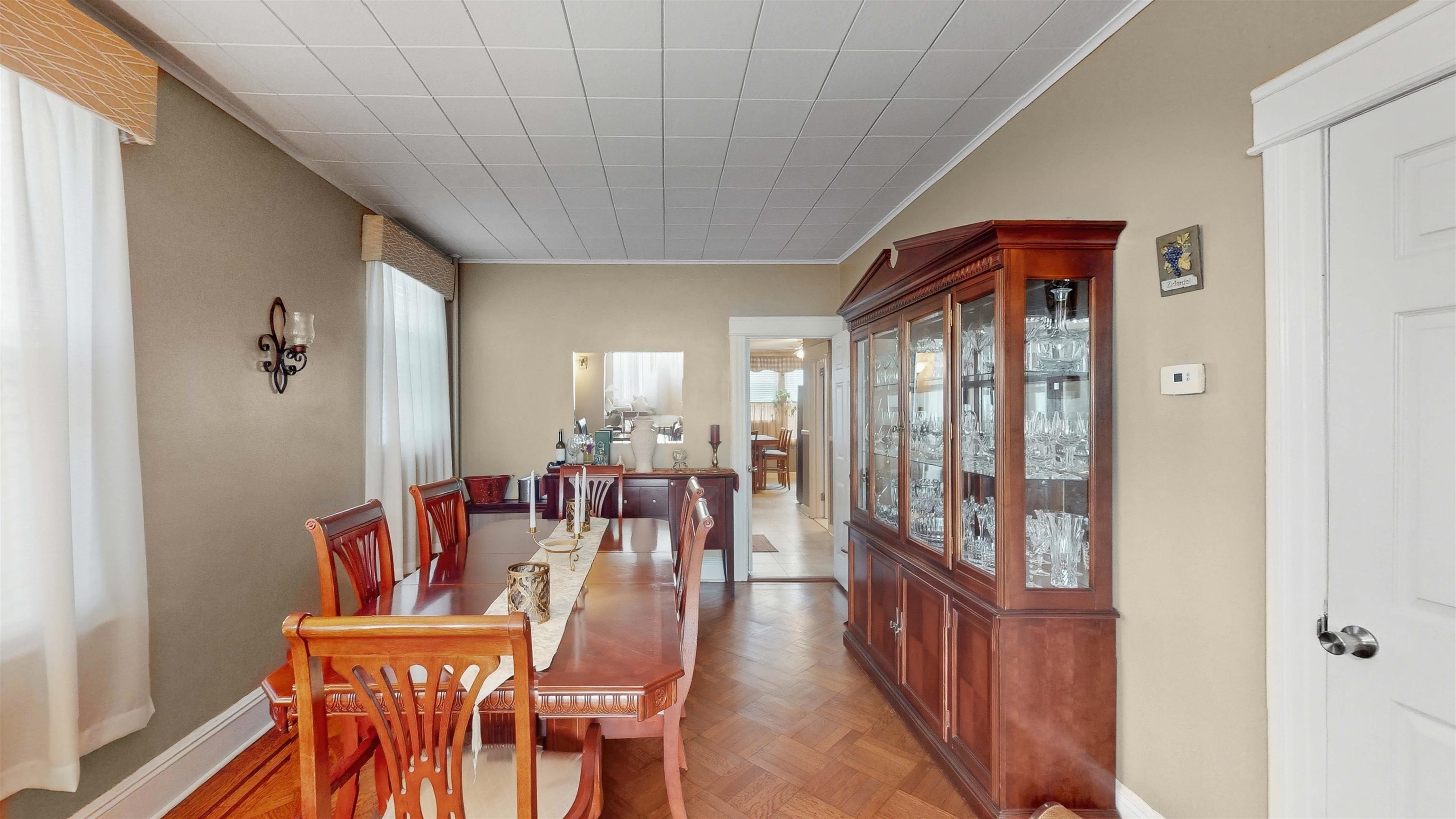 159 West 32nd Street Bayonne, NJ 07002 - Photo 6 of 47 a dining room with furniture window and wooden floor