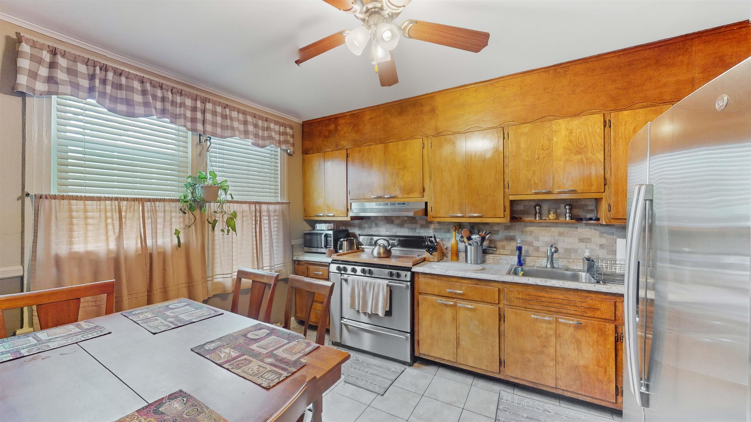 159 West 32nd Street Bayonne, NJ 07002 - Photo 10 of 47 a kitchen with a sink appliances cabinets and furniture