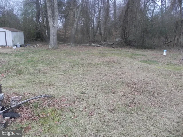 a backyard of a house with seating space