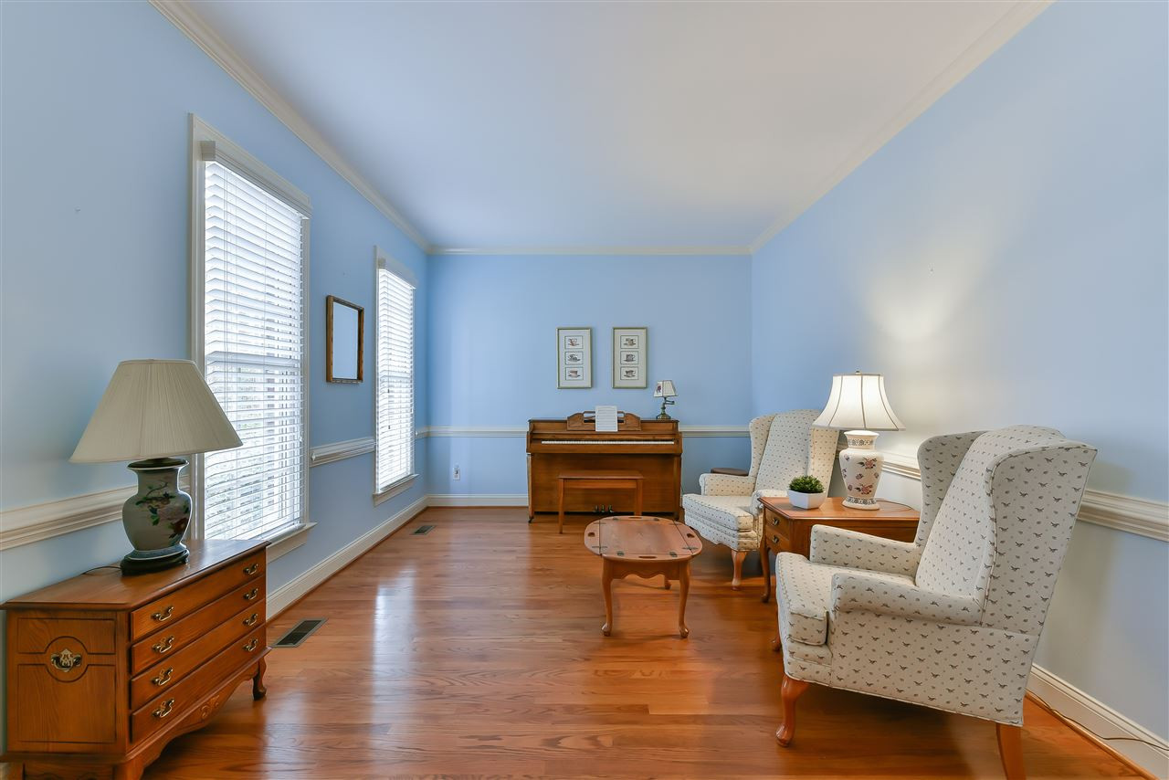 6017 Glenthorne Drive Raleigh, NC 27613 - Photo 5 of 13 Formal living room off foyer opens to dining room. Living Room