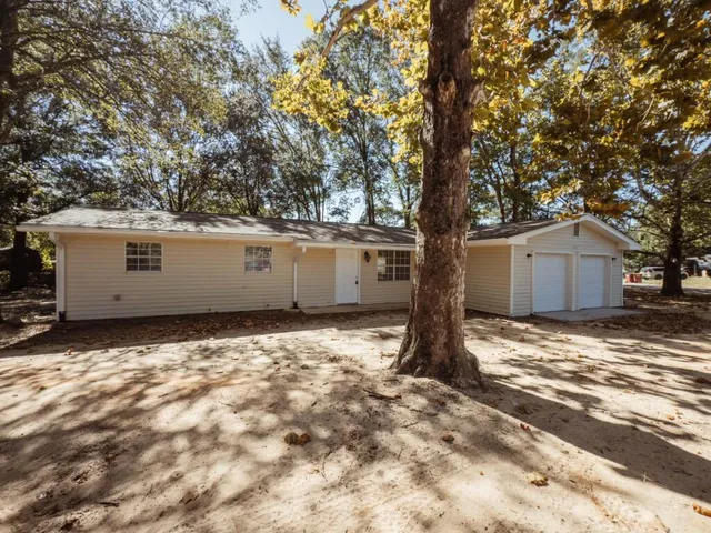 a house view with a outdoor space