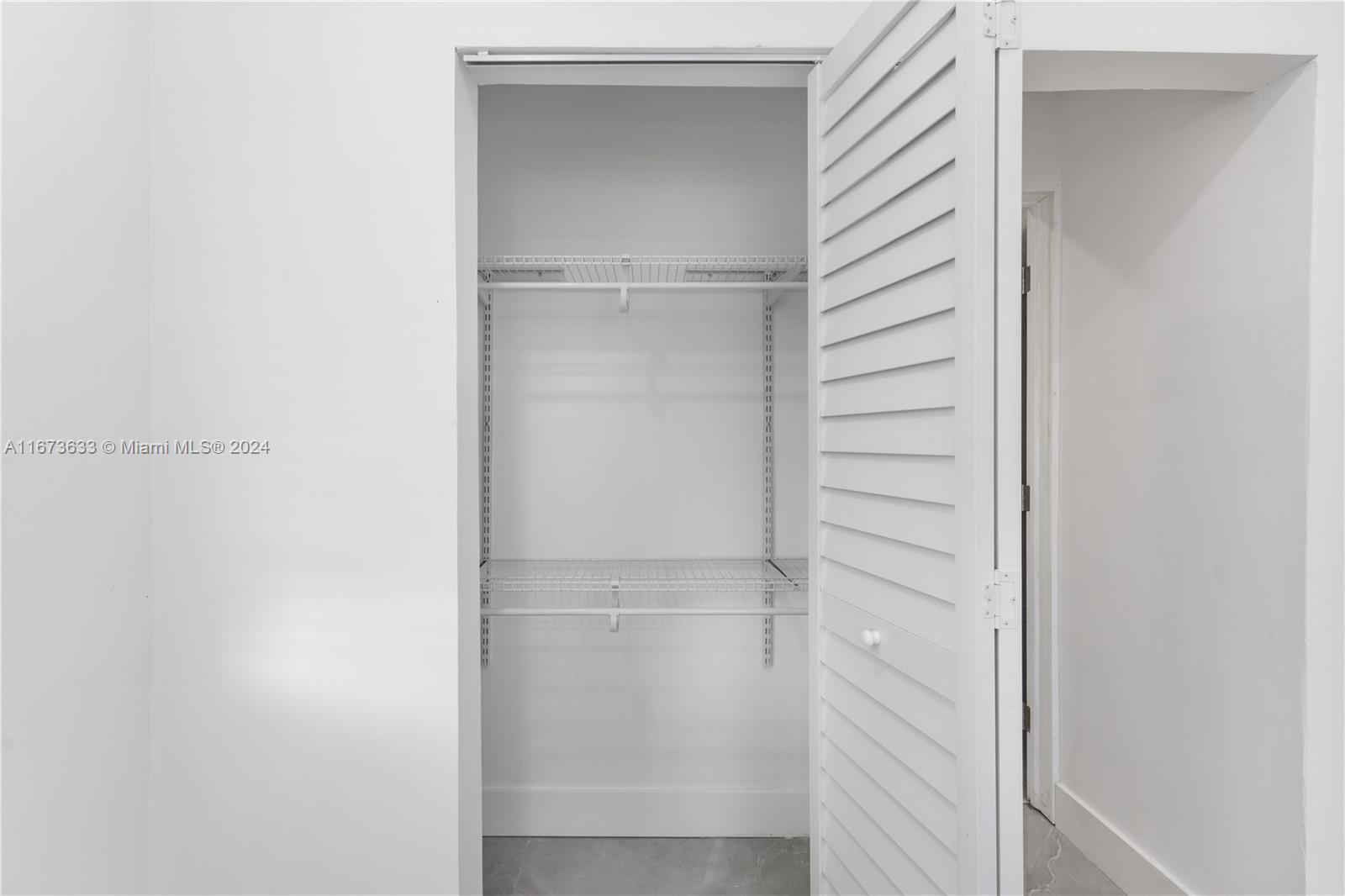 2320 Northwest 55th Street Miami, FL 33142 - Photo 14 of 34 a view of closet