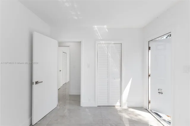 an empty room with a window