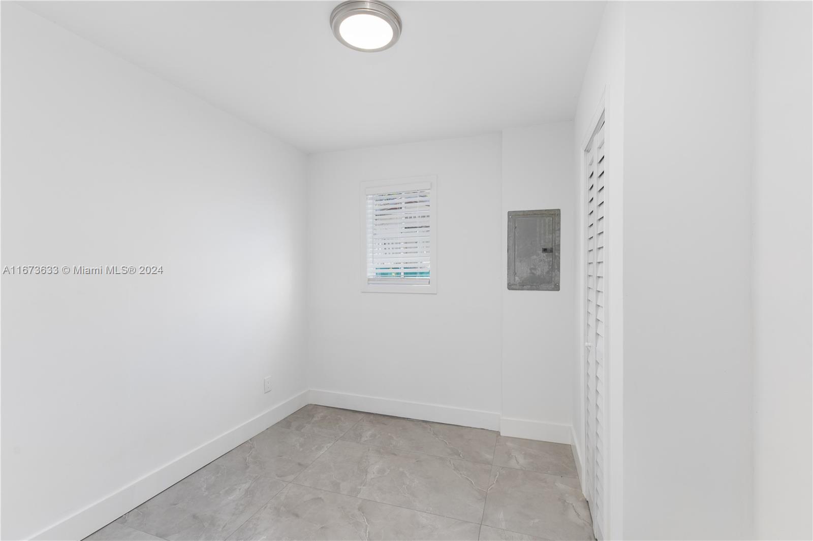 2320 Northwest 55th Street Miami, FL 33142 - Photo 19 of 34 a view of an empty room