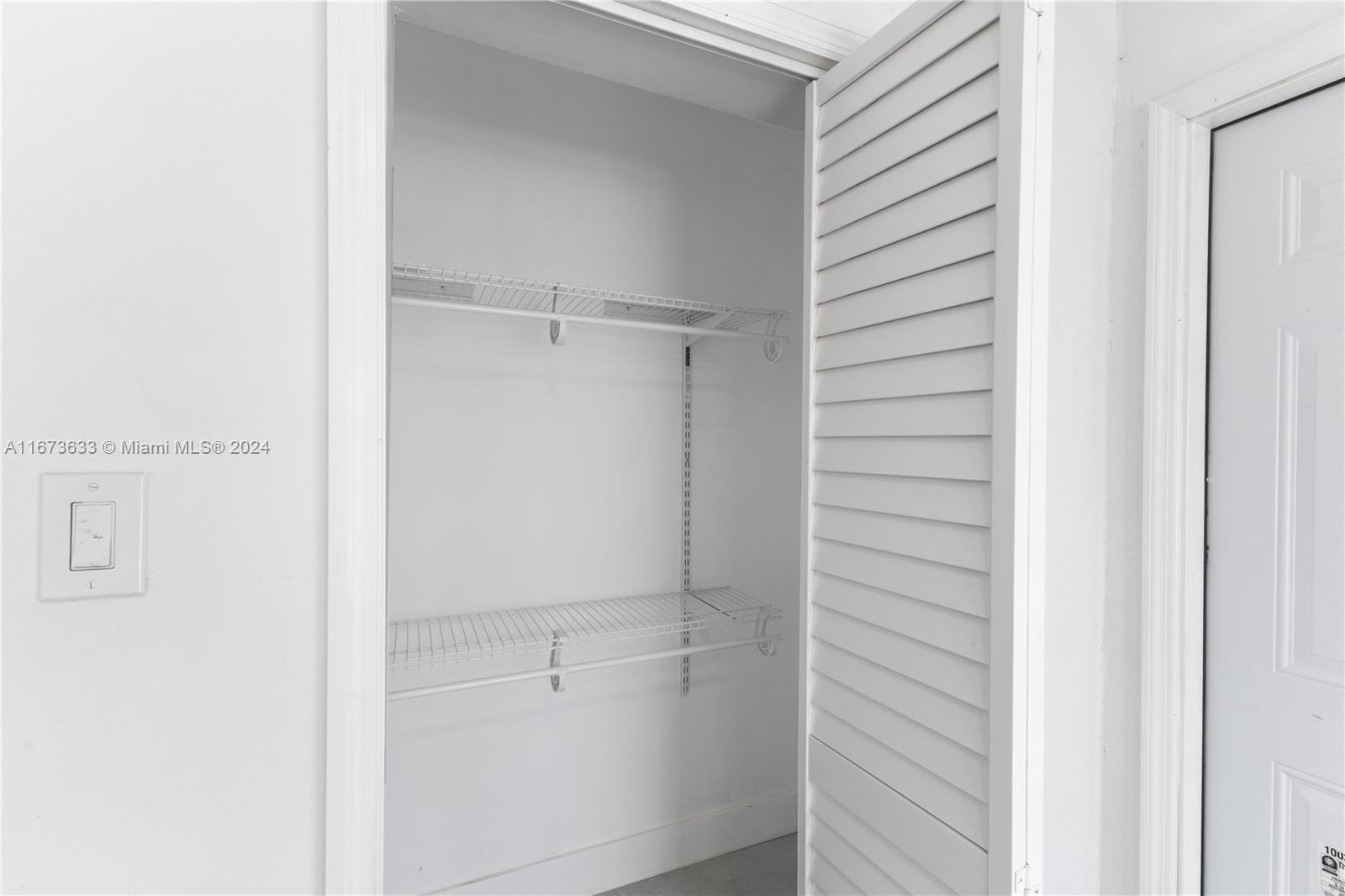 2320 Northwest 55th Street Miami, FL 33142 - Photo 20 of 34 a view of closet area
