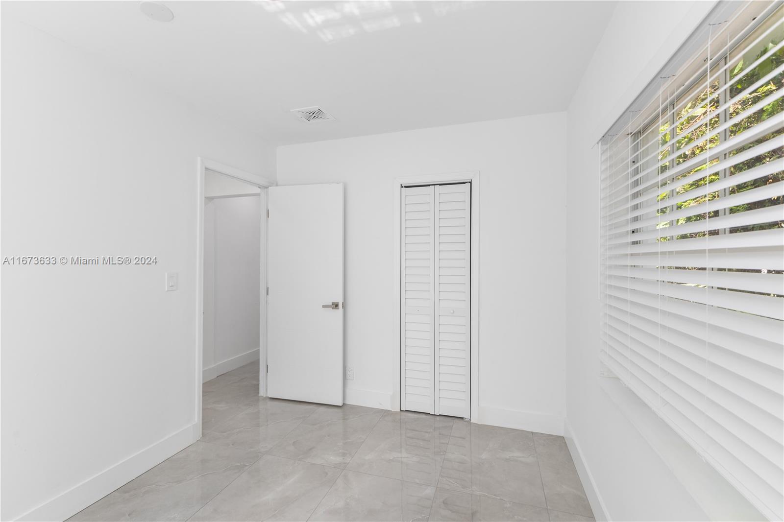 2320 Northwest 55th Street Miami, FL 33142 - Photo 23 of 34 a view of closet area