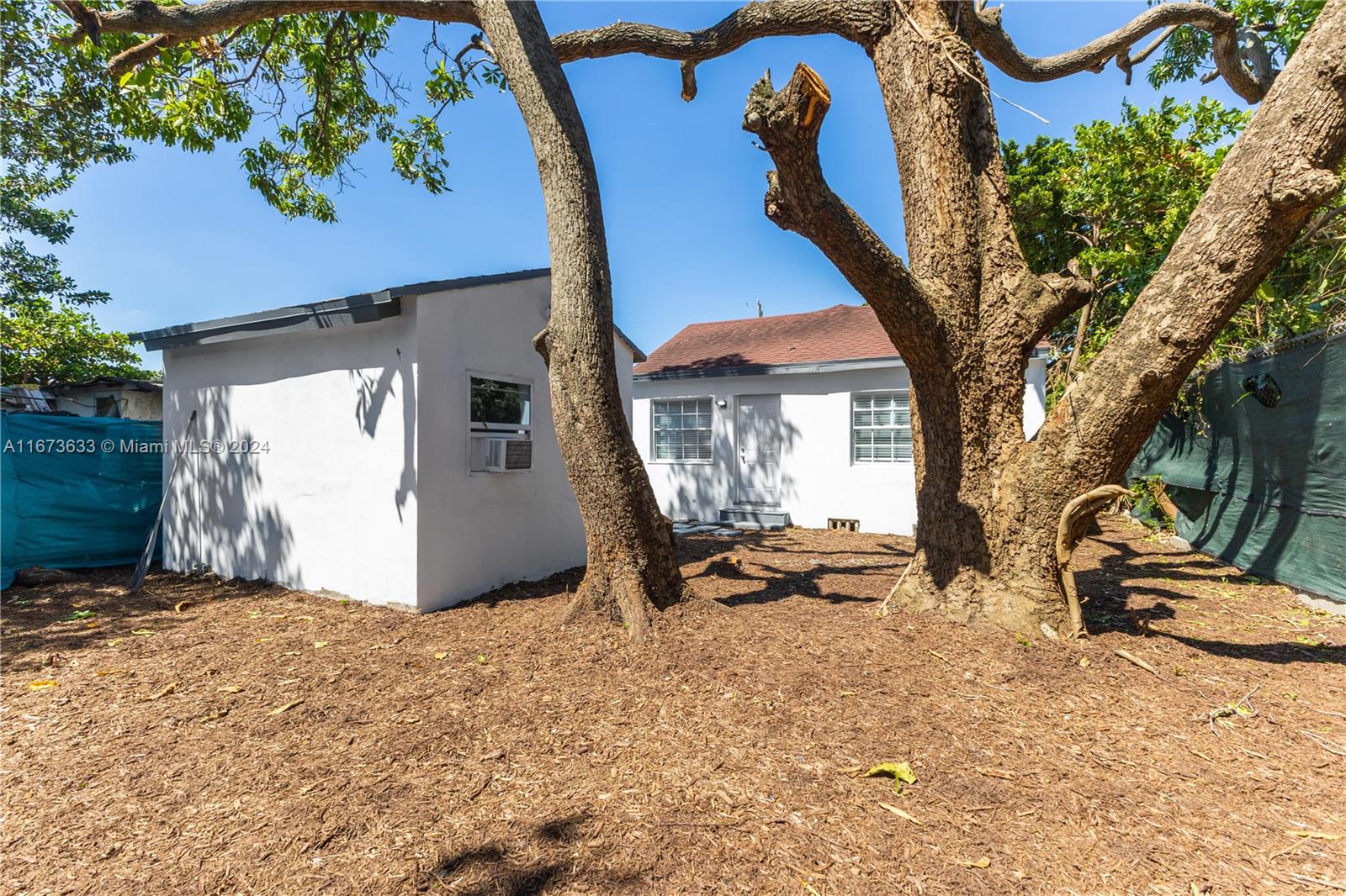 2320 Northwest 55th Street Miami, FL 33142 - Photo 32 of 34 a view of outdoor space yard and patio