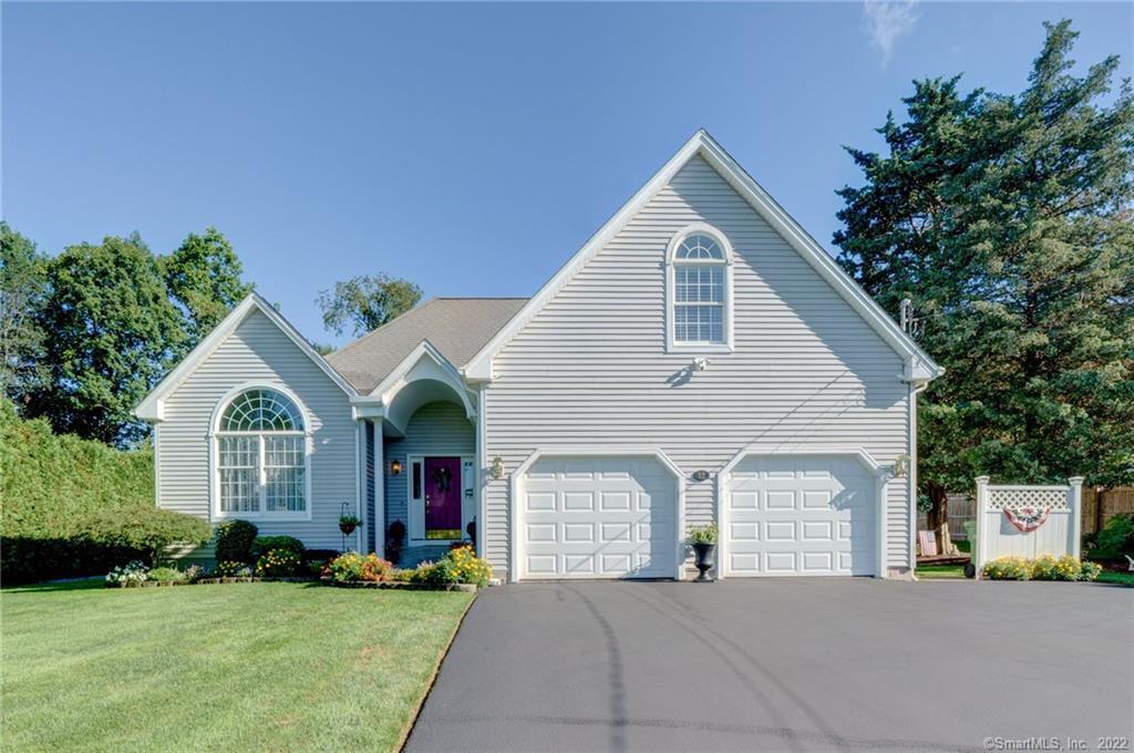 12 Timber Hill Road Cromwell, CT 06416 - Photo 1 of 1 a front view of a house with a yard and garage