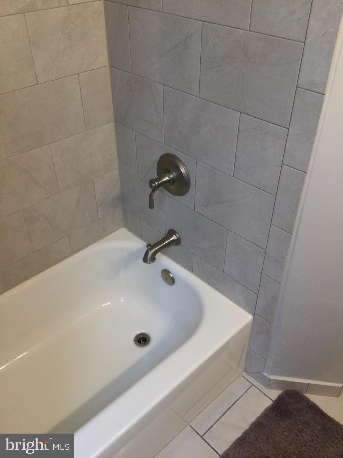 8560 Willow Oak Road Baltimore, MD 21234 - Photo 17 of 31 Ceramic Tile surround