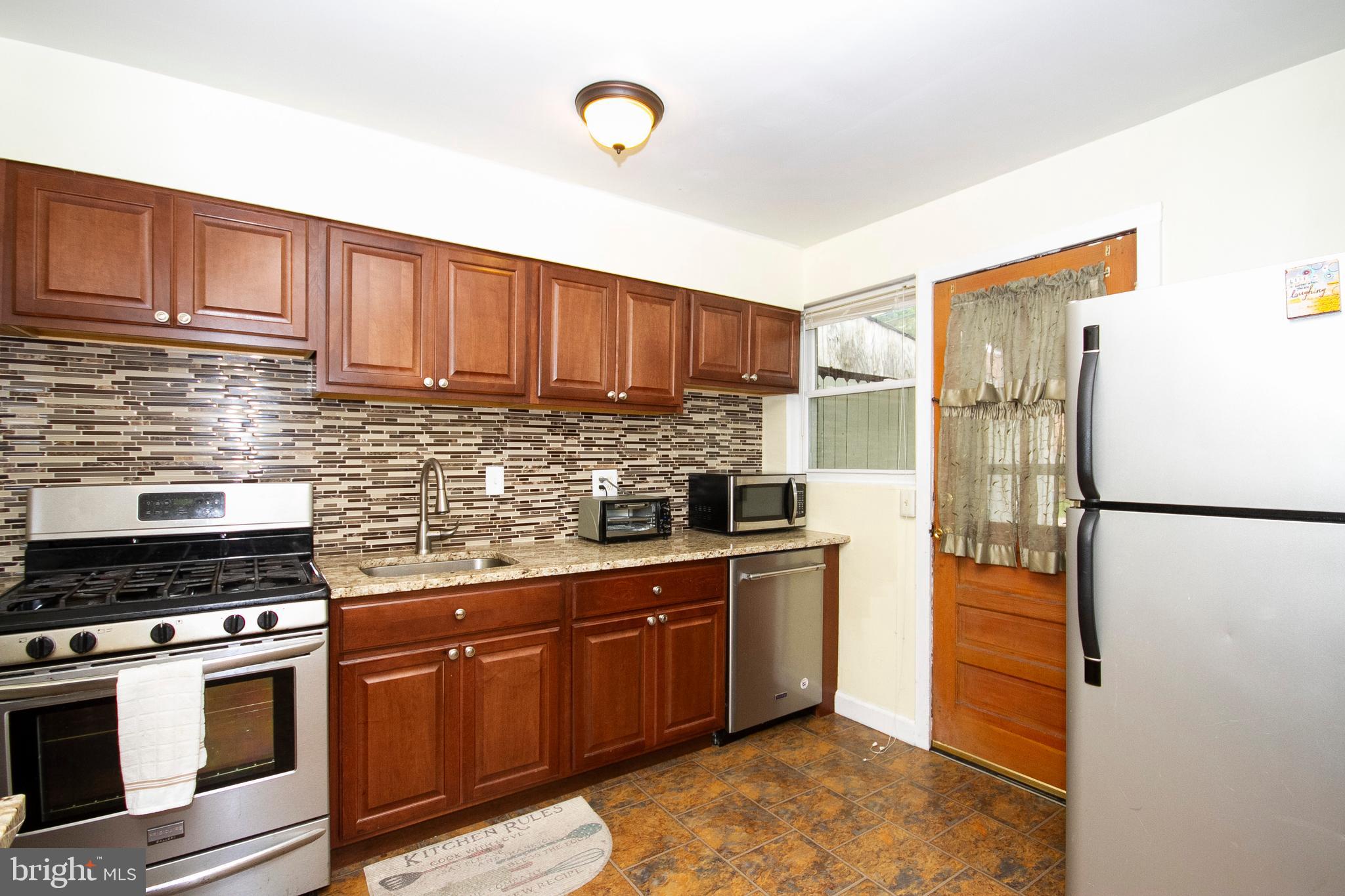 8560 Willow Oak Road Baltimore, MD 21234 - Photo 6 of 31 Beautiful tile backsplash!