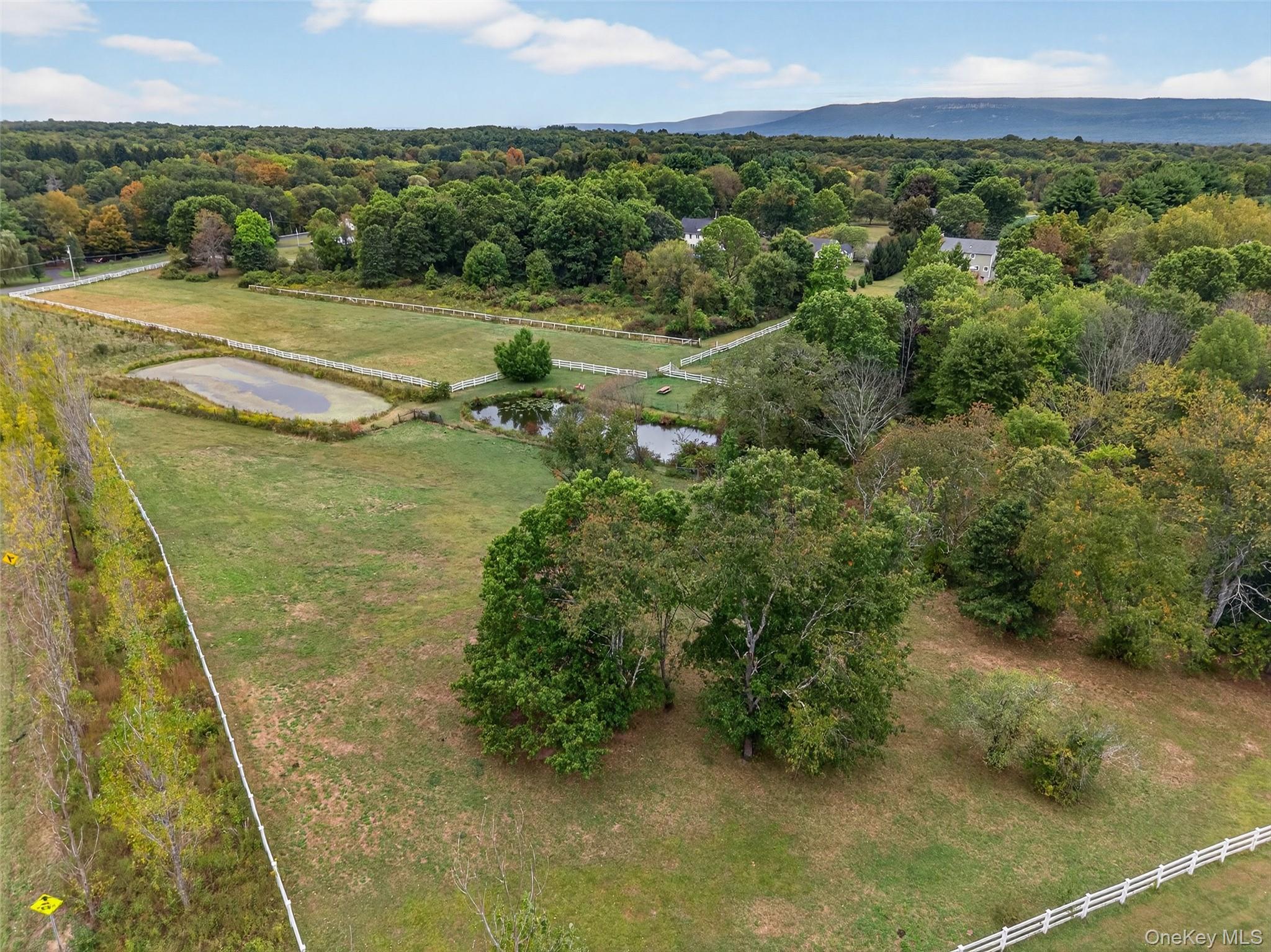 214 Dubois Road Gardiner, NY 12561 - Photo 36 of 38 a view of a lake with a yard