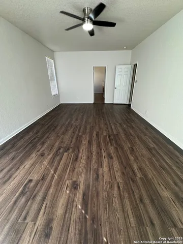 a bathroom with a tub and a sink