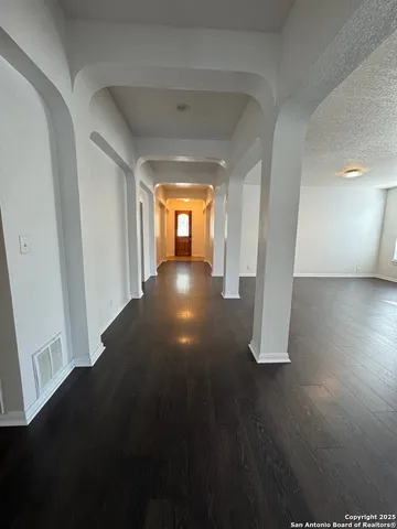 a view of hallway with stairs