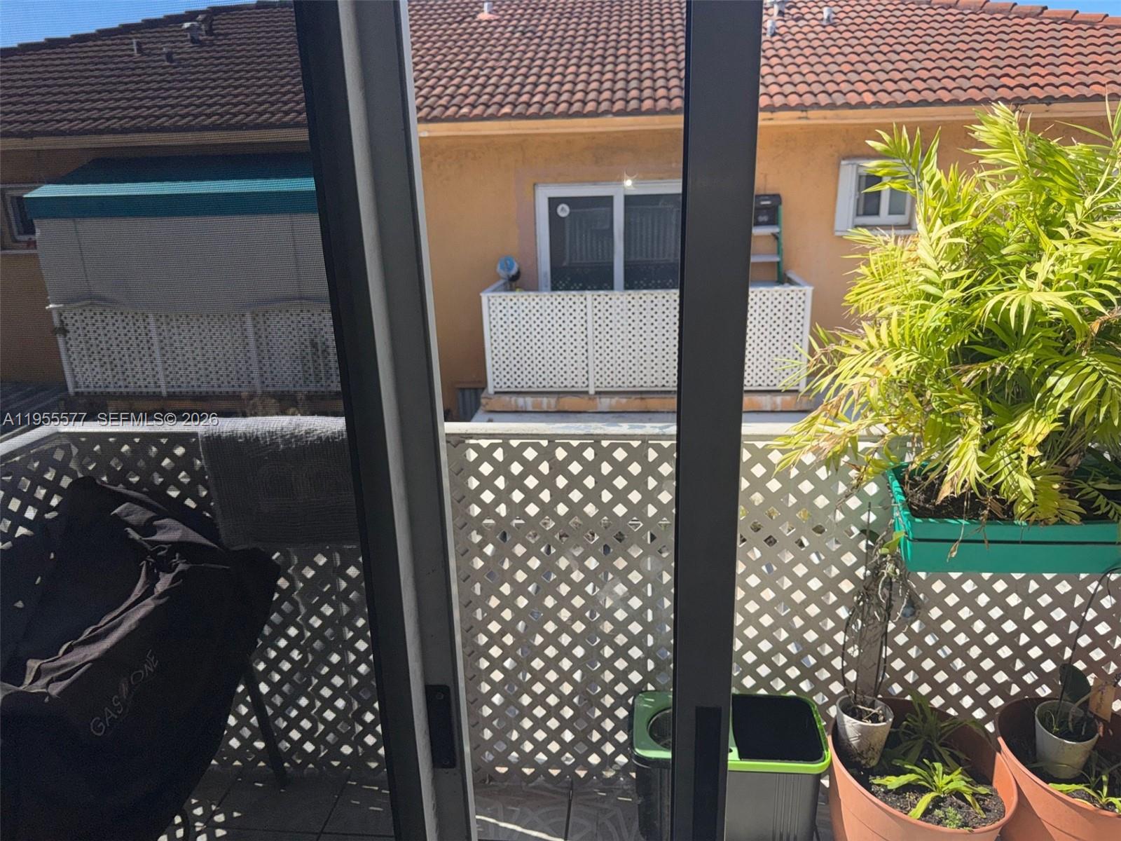 3375 West 76th Street, Unit 223 Hialeah, FL 33018 - Photo 21 of 26 a picture of a door