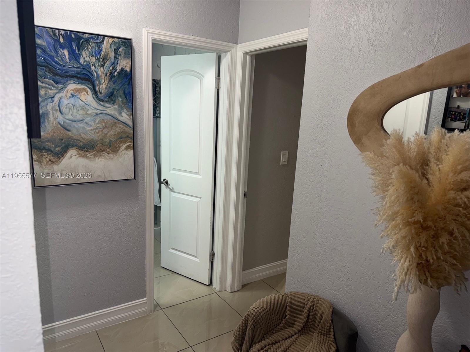 3375 West 76th Street, Unit 223 Hialeah, FL 33018 - Photo 8 of 26 a view of walk in closet