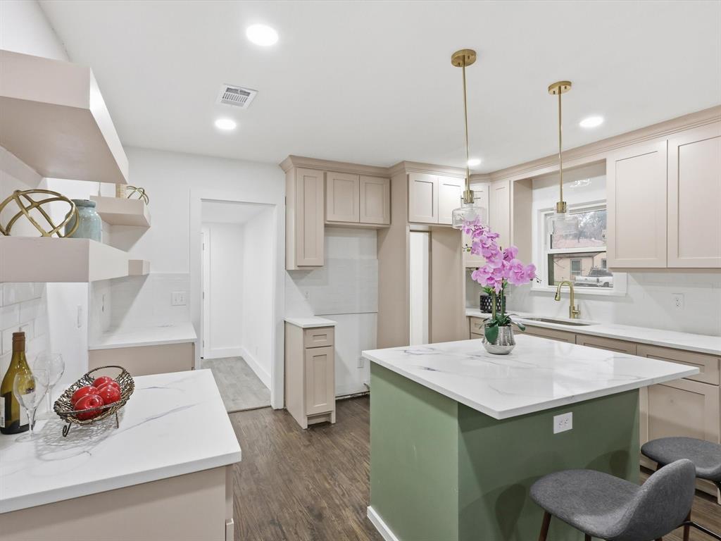 6624 Reeves Street Richland Hills, TX 76118 - Photo 11 of 27 a kitchen with stainless steel appliances a sink and cabinets