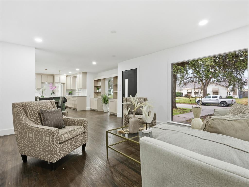 6624 Reeves Street Richland Hills, TX 76118 - Photo 2 of 27 a living room with furniture and a large window