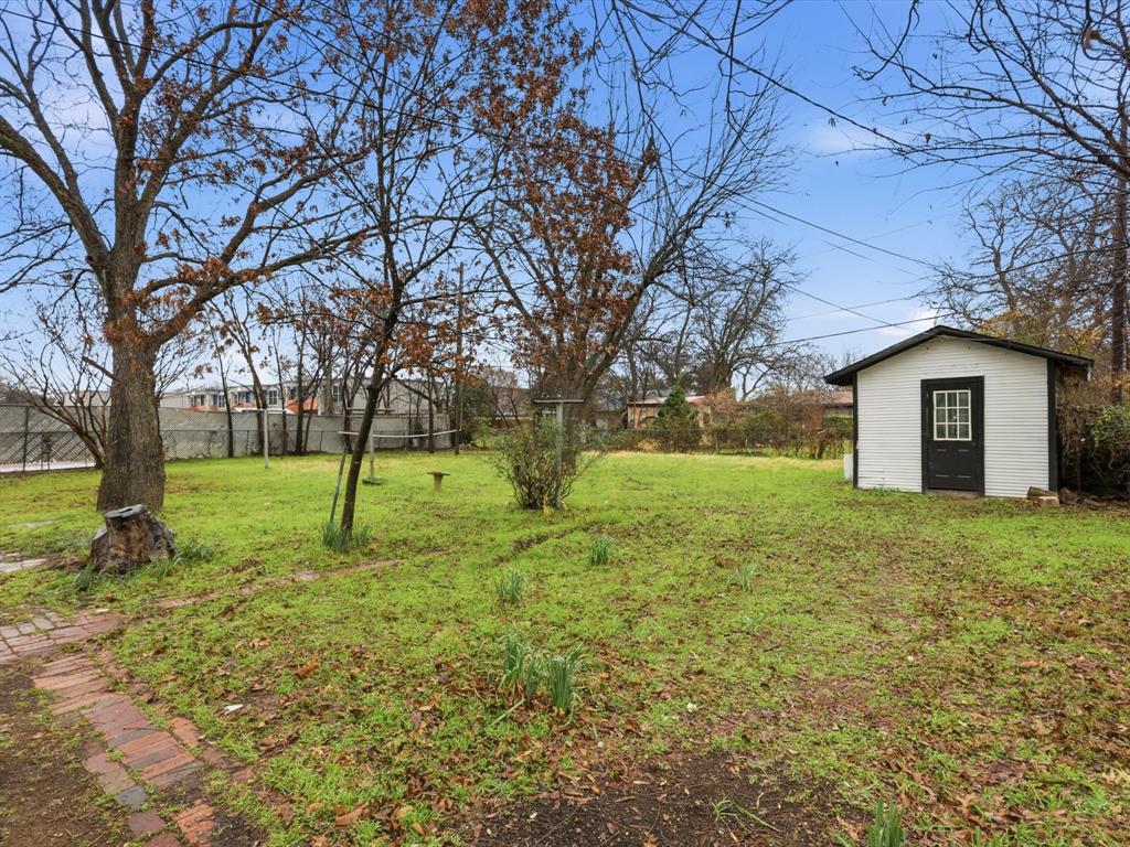 6624 Reeves Street Richland Hills, TX 76118 - Photo 26 of 27 a view of a house with a backyard