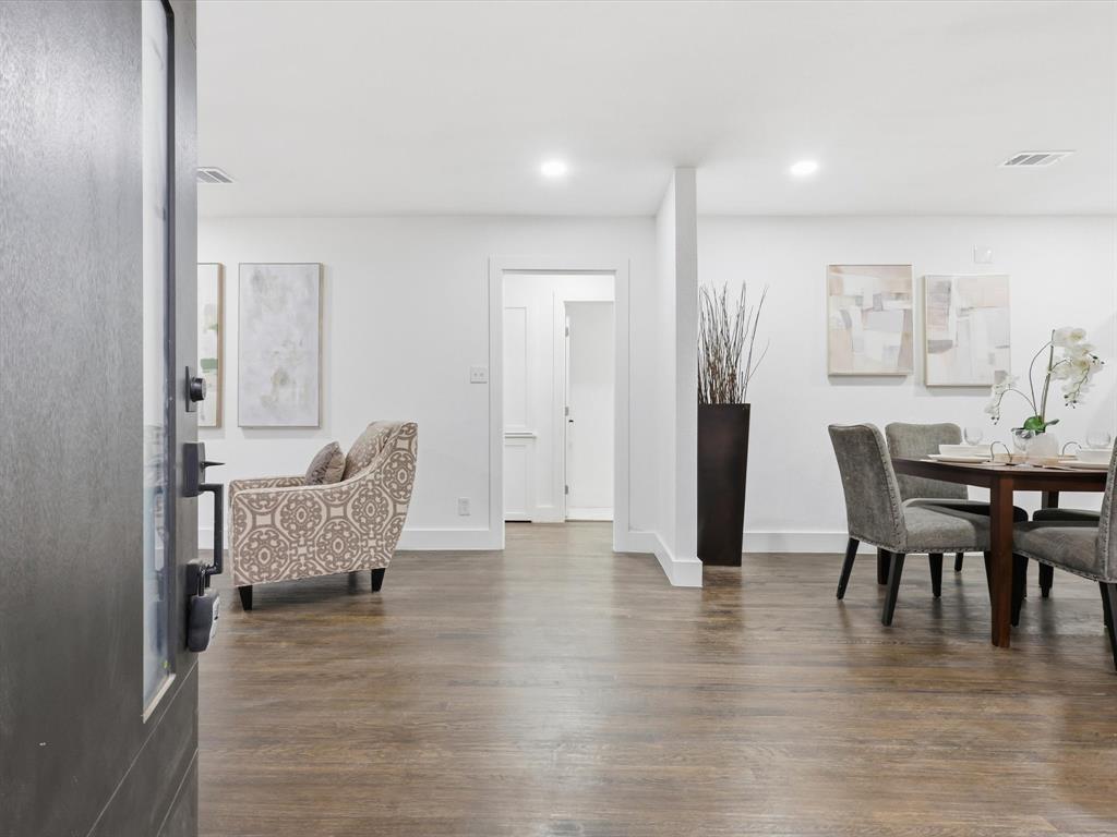 6624 Reeves Street Richland Hills, TX 76118 - Photo 6 of 27 a view of a dining room with furniture and wooden floor