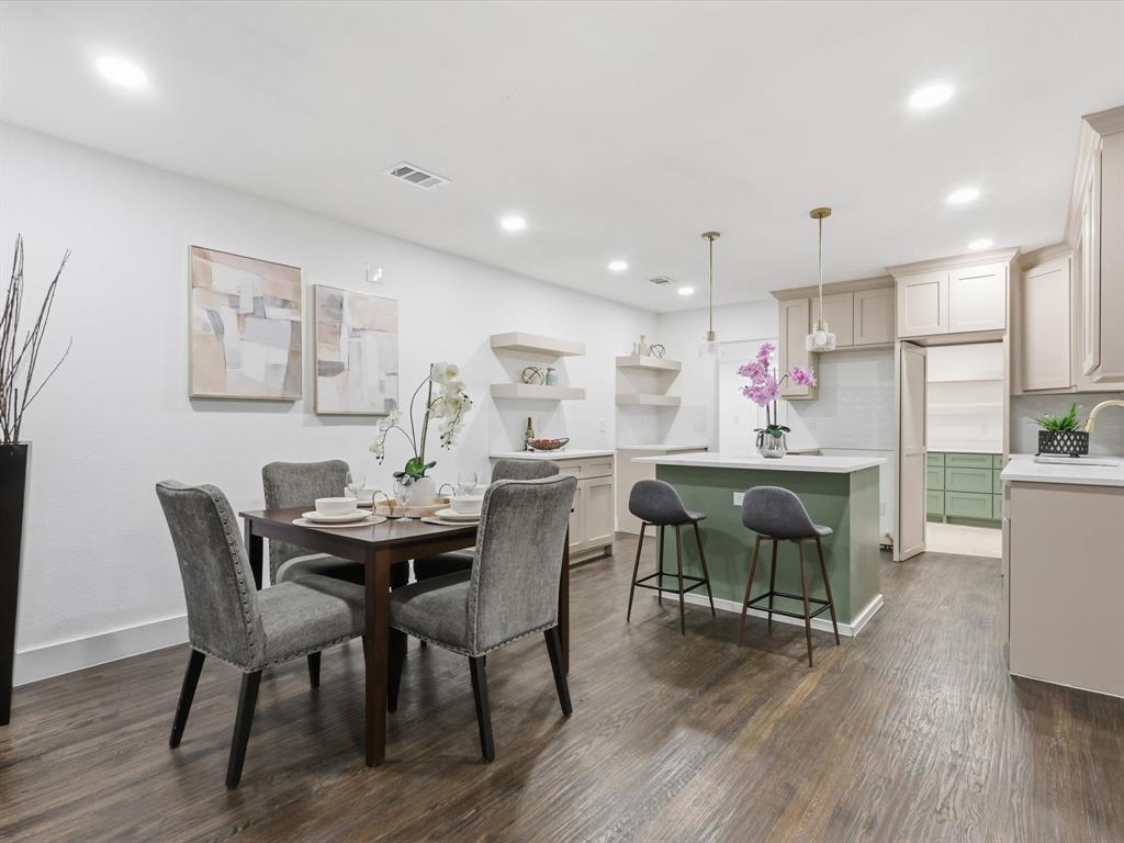 6624 Reeves Street Richland Hills, TX 76118 - Photo 10 of 27 a view of a dining room with furniture and wooden floor