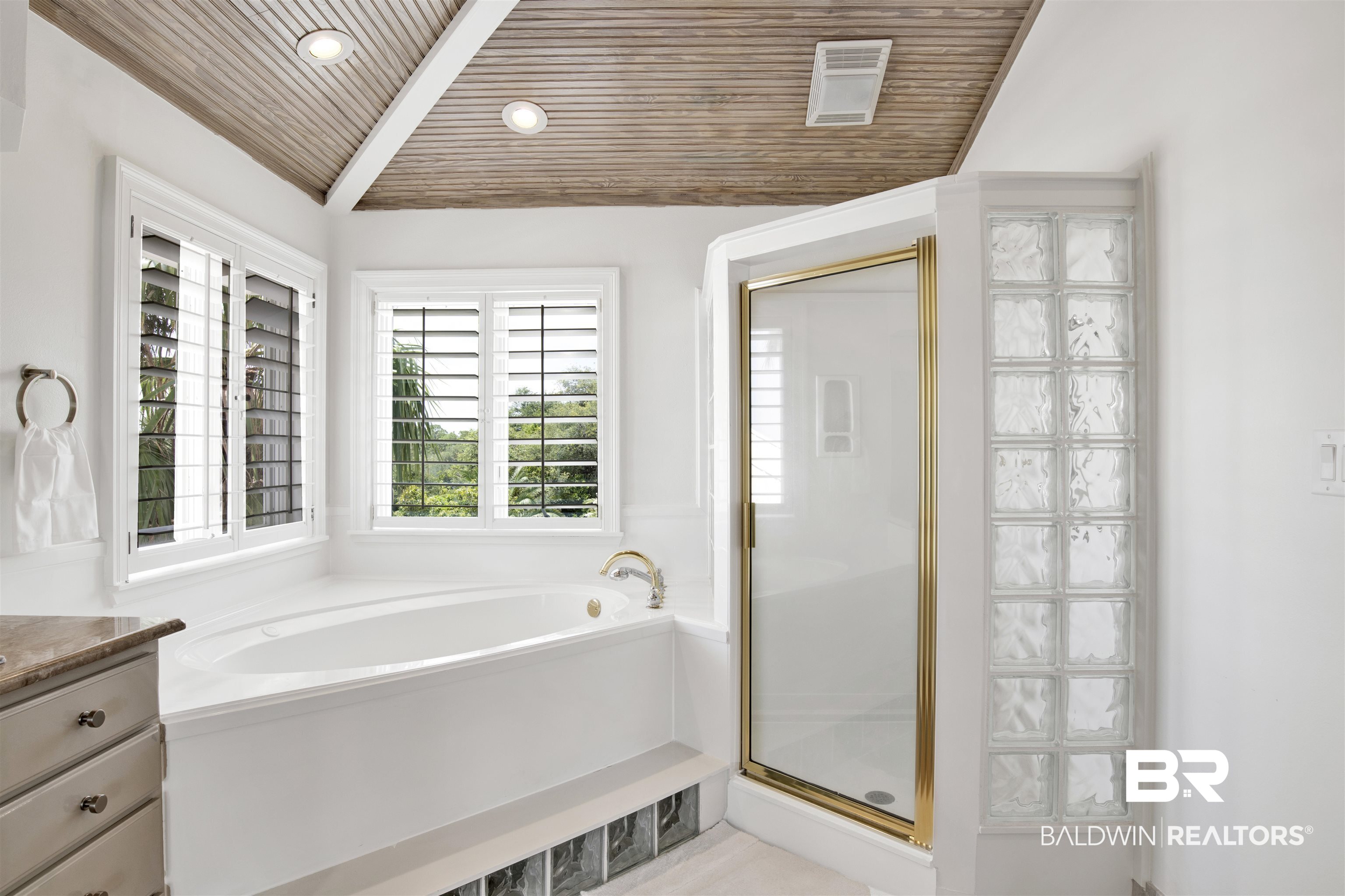 33400 River Road Orange Beach, AL 36561 - Photo 63 of 72 Bathroom with vanity, wooden ceiling, shower with separate bathtub, and lofted ceiling