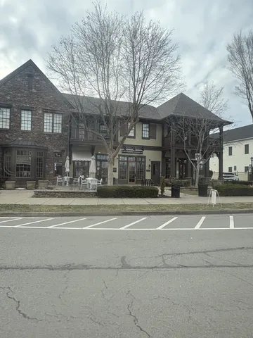 a view of a building with a street