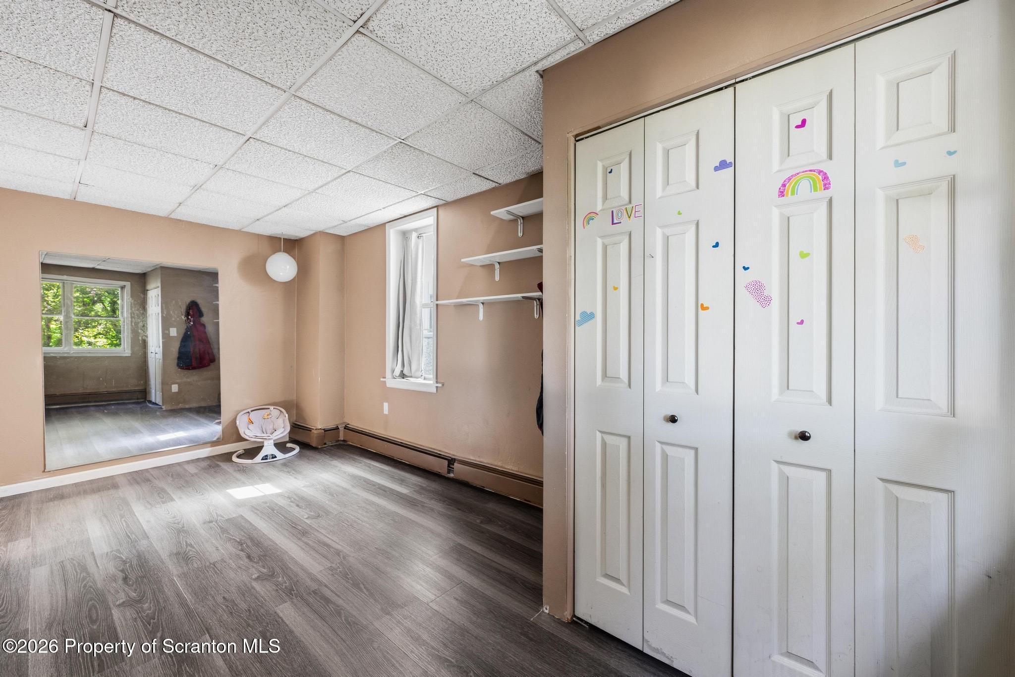 518 Prospect Avenue Scranton, PA 18505 - Photo 25 of 59 a view of an empty room with closet and a window
