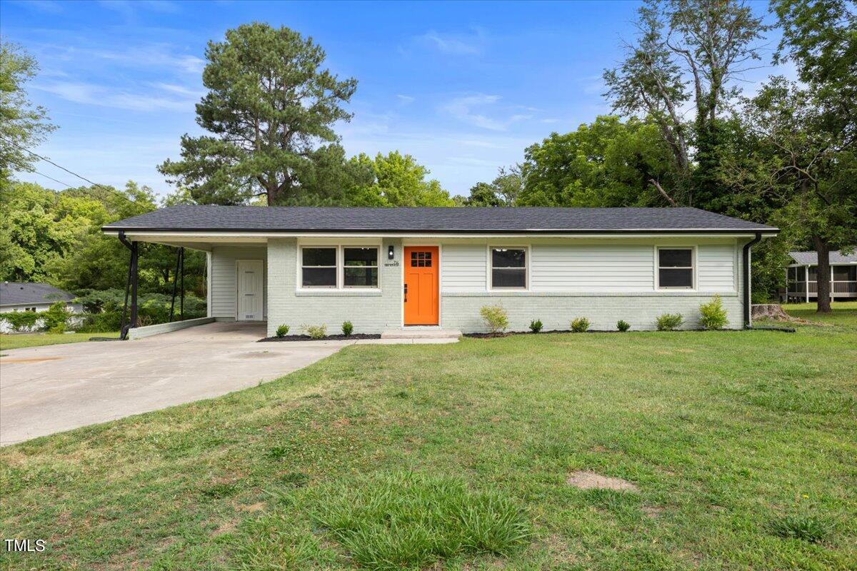 714 Friar Tuck Road Raleigh, NC 27610 - Photo 1 of 25 front view of house with a yard