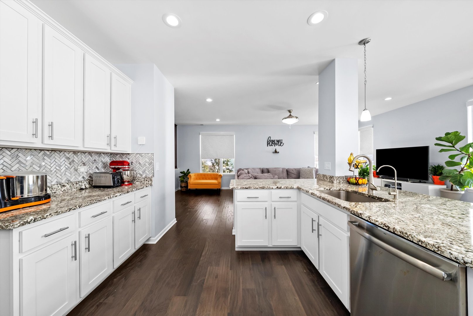 4177 Irving Road Aurora, IL 60504 - Photo 14 of 39 a kitchen with sink stove and cabinets