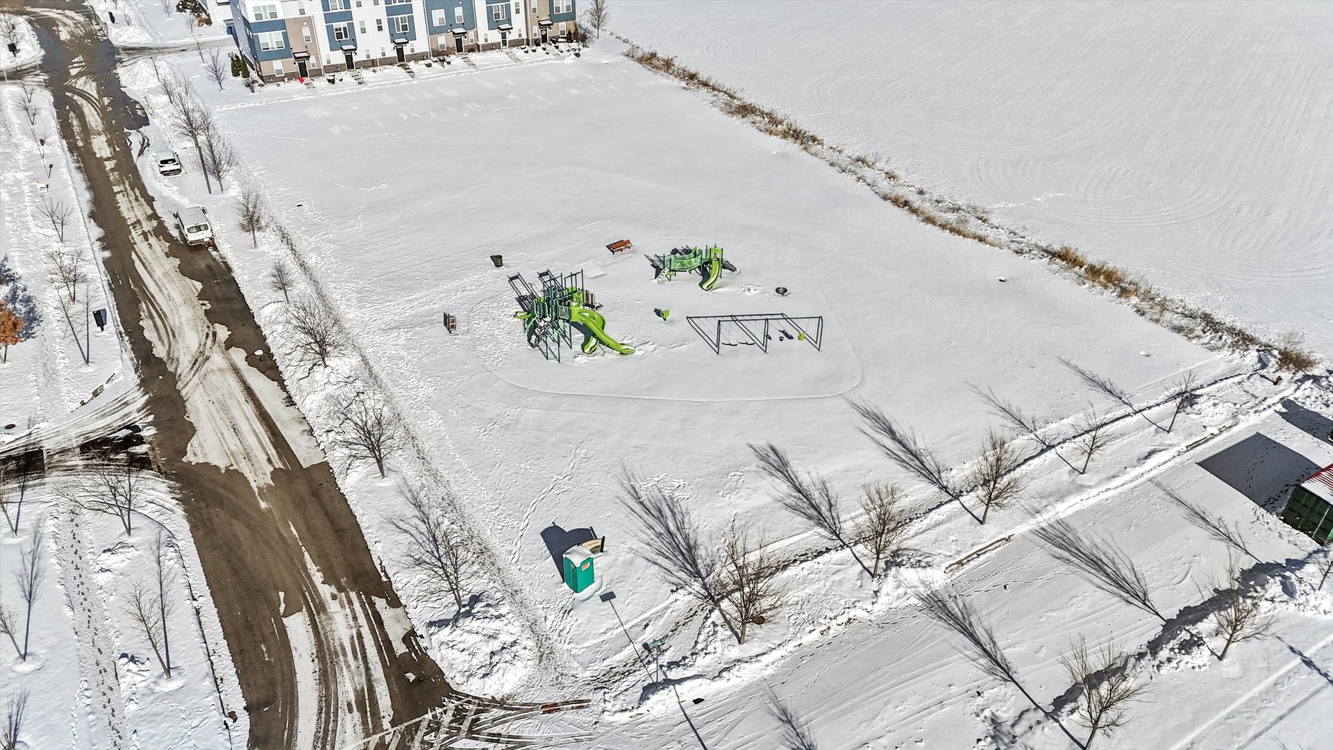 4177 Irving Road Aurora, IL 60504 - Photo 20 of 39 a white bed sitting in a bedroom next to a chandelier