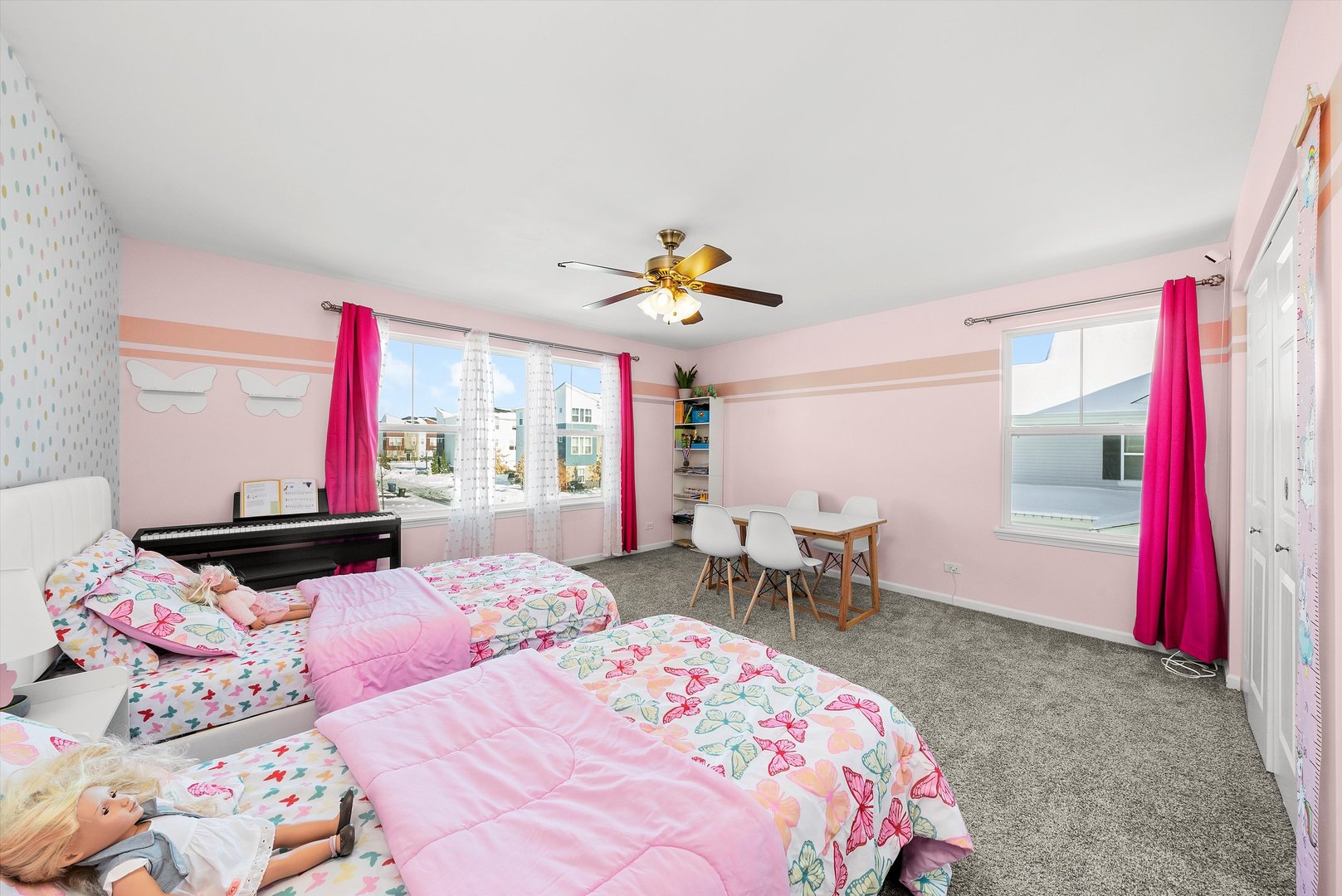 4177 Irving Road Aurora, IL 60504 - Photo 22 of 39 a bedroom with a bed and a chandelier