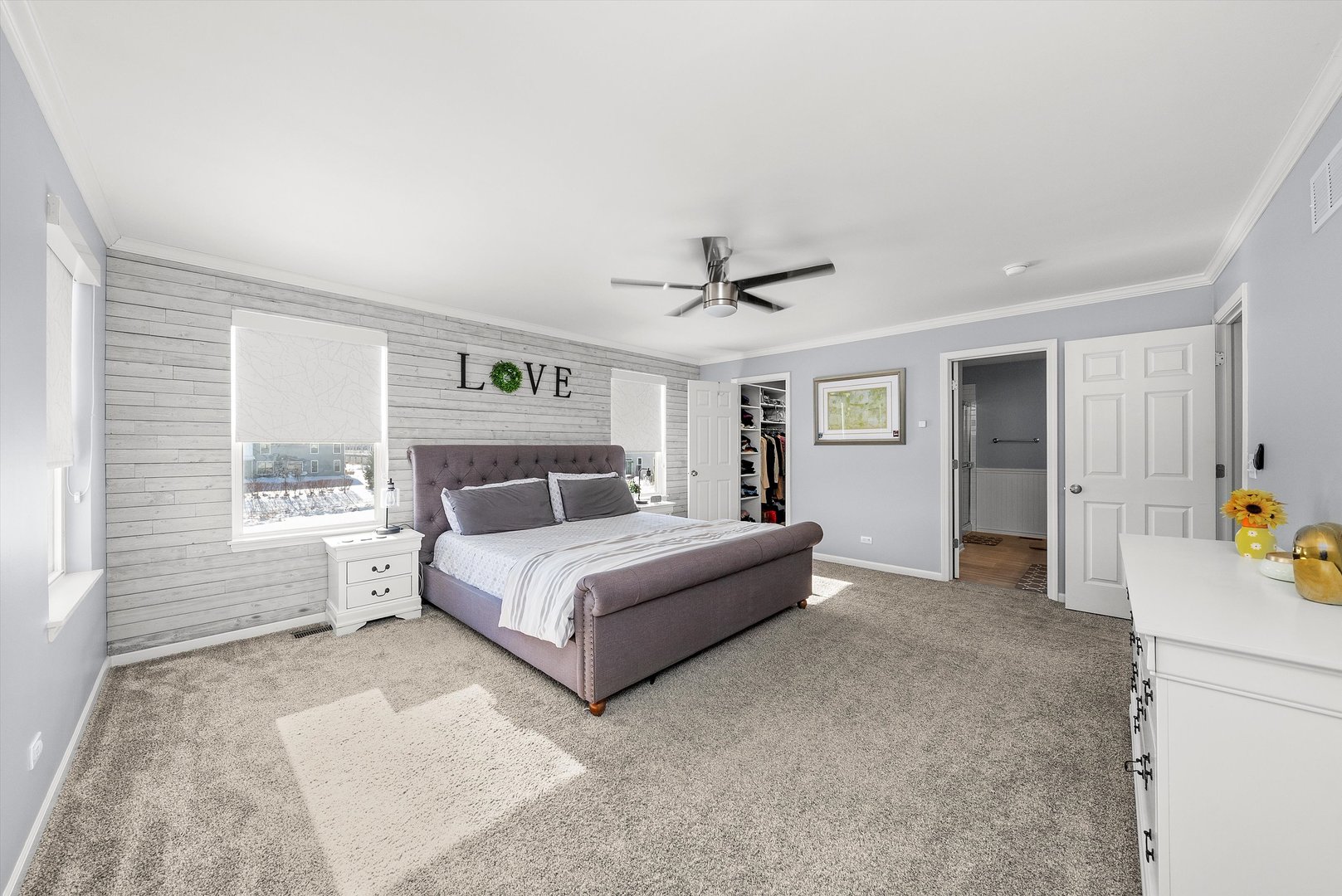 4177 Irving Road Aurora, IL 60504 - Photo 30 of 39 a spacious bedroom with a bed and a large window