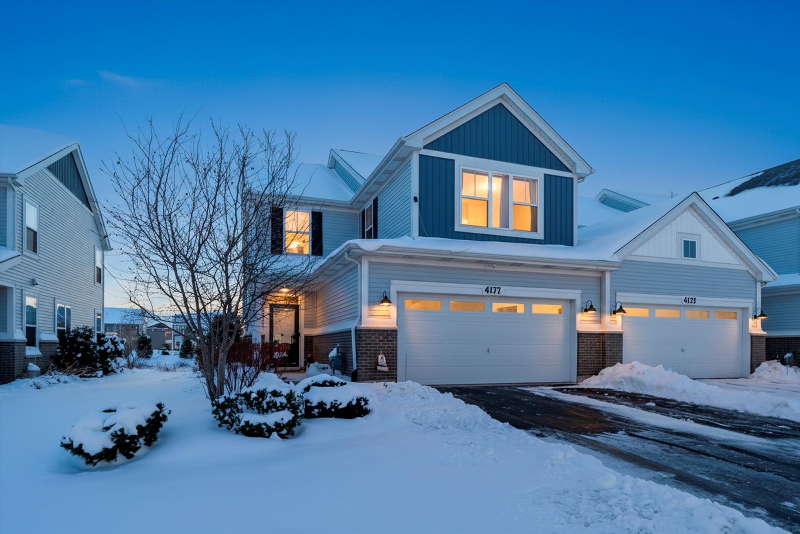 4177 Irving Road Aurora, IL 60504 - Photo 3 of 39 a front view of a house with garage