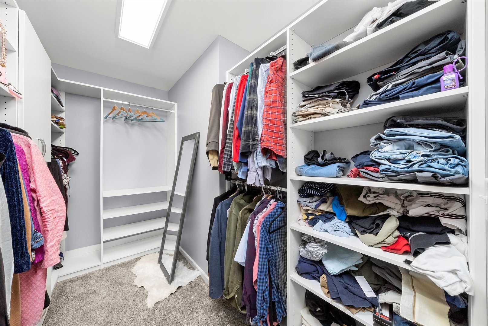 4177 Irving Road Aurora, IL 60504 - Photo 31 of 39 a view of walk in closet with clothes and shoes