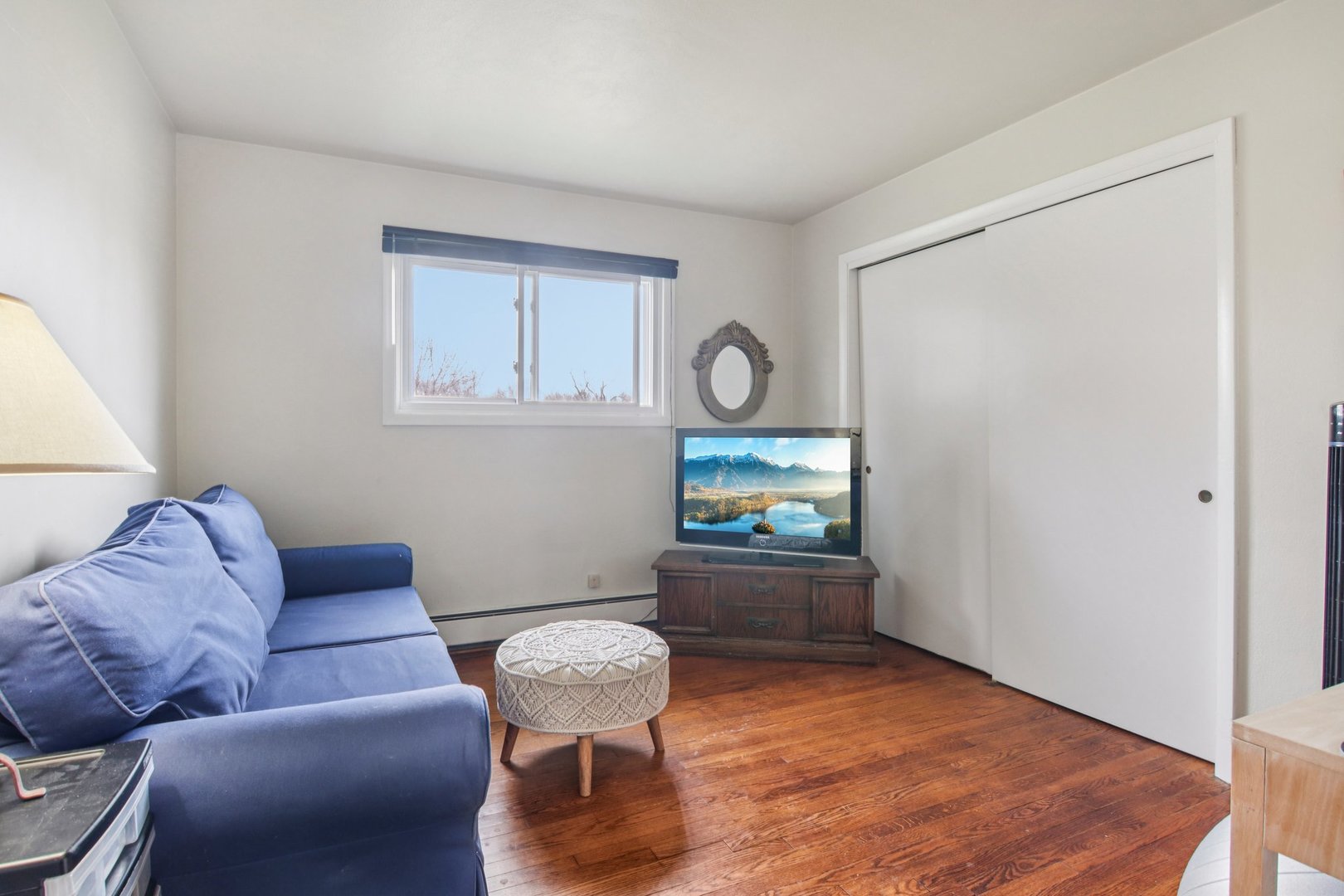 238 West Frontage Road Northfield, IL 60093 - Photo 10 of 16 a living room with furniture and a flat screen tv