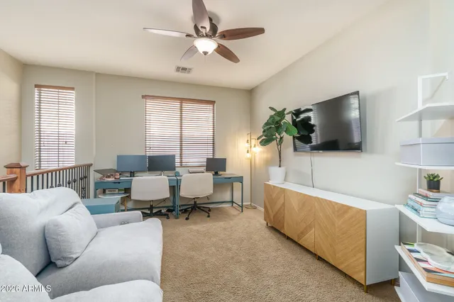 a bathroom with a tub a sink and mirror