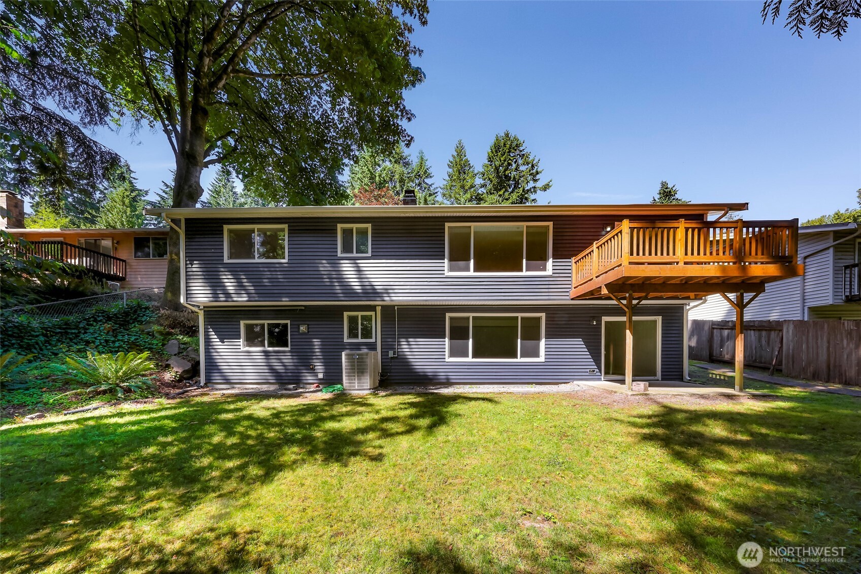 21313 2nd Drive Southeast Bothell, WA 98021 - Photo 24 of 30 a front view of a house with a yard table and chairs